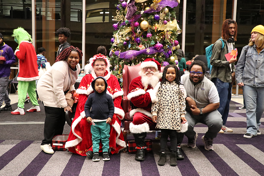 family with Santa and Mrs. Claus