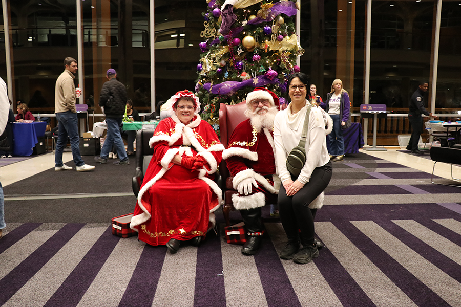 staff with Santa and Mrs. Claus