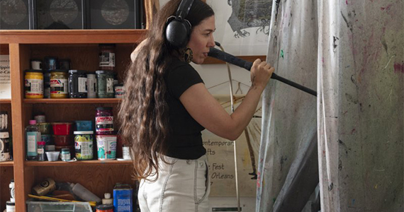 Pippin Frisbie-Calder working in her art studio